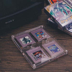 Methacrylate box with UV protection - Four loose Nintendo Game Boy cartridges - Free shipping! - Does not include games, consoles or others