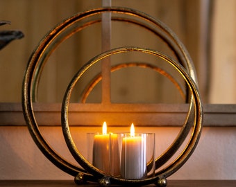 Metal sculpture with glass lantern in silver and gold