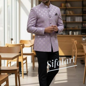 May include: A light purple jacket with a mandarin collar and a subtle floral pattern, paired with black trousers and brown leather shoes. The jacket has a pocket square. The word "Sifatart" is written in white.
