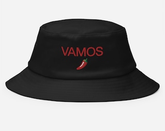 May include: Black bucket hat with the embroidered word "VAMOS" in red, along with a red chili pepper. The hat is a casual accessory, suitable for sun protection and everyday wear.