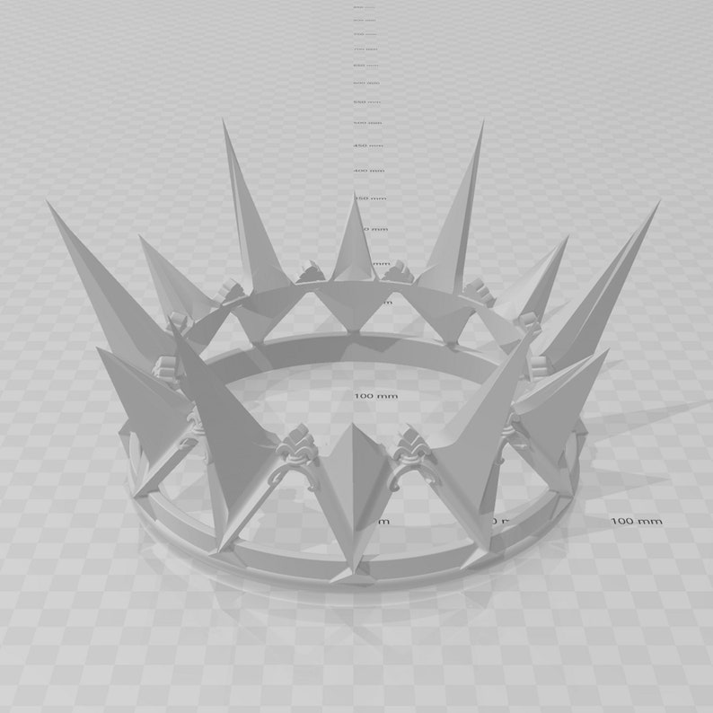 May include: A 3D-printed, light gray crown with a series of sharp, triangular spikes. The crown's base features decorative elements and geometric shapes. The image includes a scale indicating 100 mm increments.