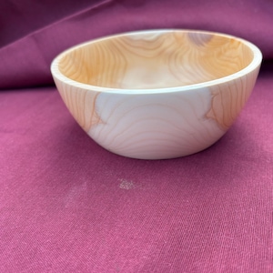 Decorative, hand turned wooden bowl made from Yew wood