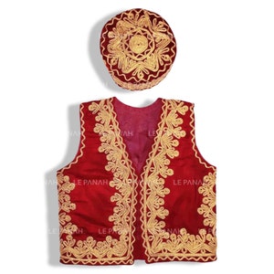 May include: A red velvet waistcoat with gold embroidery and a matching red velvet hat with gold embroidery.