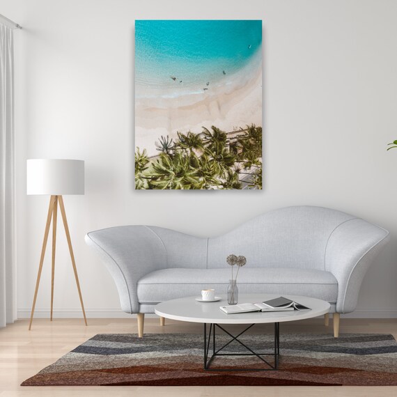 Impression sur toile - Image sur toile - Une plage avec des palmiers dans un paysage tropical - 50x70cm