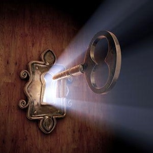 May include: A golden key with a large, ornate head is inserted into a keyhole in a wooden door. Light shines through the keyhole, illuminating the key.