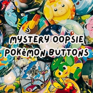 May include: A selection of colourful Pokémon badges, each with a different character design. The text "MYSTERY OOPSIE POKÉMON BUTTONS" is written across the image. The badges display bright colours and detailed illustrations.
