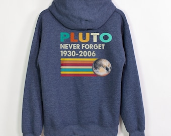 May include: A navy blue hooded sweatshirt with a vintage-style graphic on the back. The graphic features the word "PLUTO" in rainbow colors, the text "NEVER FORGET 1930-2006", and a stylized image of Pluto.