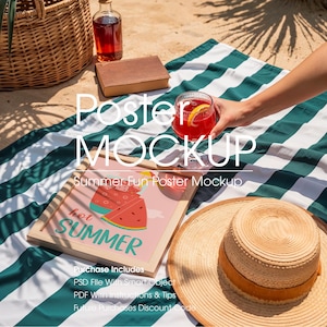 May include: A summer-themed mockup featuring a framed poster with a watermelon design and the words "hot SUMMER." A straw hat, a glass of red drink with a lemon slice, and a striped beach towel are also visible. A wicker basket and a bottle are in the background.