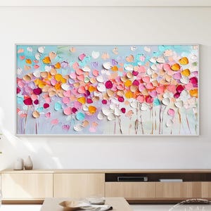 Bring joy to your space with this vibrant abstract floral oil painting. Created with a palette knife, its rich texture and bold colors make a stunning statement. This hand-painted canvas is perfect for modern home decor, adding warmth to your living room, bedroom, or office. A unique and eye-catching piece that blends contemporary and impressionist styles. Custom sizes available.