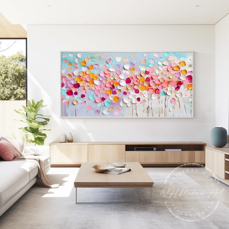 Bring joy to your space with this vibrant abstract floral oil painting. Created with a palette knife, its rich texture and bold colors make a stunning statement. This hand-painted canvas is perfect for modern home decor, adding warmth to your living room, bedroom, or office. A unique and eye-catching piece that blends contemporary and impressionist styles. Custom sizes available.