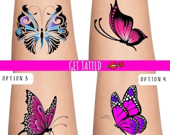 May include: Four different butterfly tattoo designs. Option 1 is a black and blue butterfly with purple accents. Option 2 is a pink butterfly. Option 3 is a pink and purple butterfly with white dots. Option 4 is a purple and pink butterfly with white dots.
