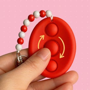 Textured fidget keychain, silicone worry stone, tactile sensory toy for adults