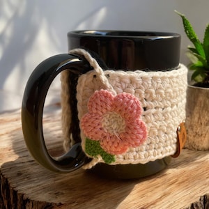 Crochet mug cozy with flower, handmade coffee cup sleeve, fall tea or coffee warmer, cozy tea lover gift, reusable mug cover warmer