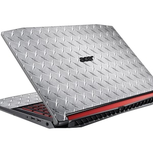 May include: A silver laptop with a diamond plate pattern on the lid. The laptop has a red accent around the edge and the Acer logo is visible on the lid.