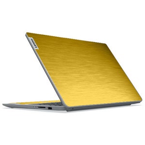 May include: A gold-colored laptop with a brushed metal texture. The laptop is slightly open, revealing the keyboard and screen. The Lenovo logo is visible on the top left corner of the laptop.