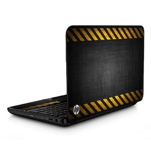 May include: Black laptop with a yellow and black striped design. The design resembles a caution tape pattern. The HP logo is visible on the laptop.