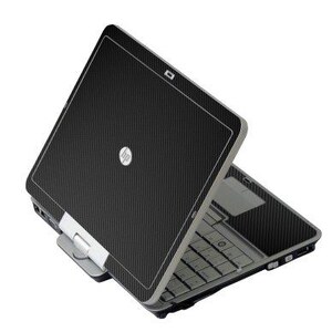 May include: Black HP laptop with a textured carbon fiber design. The laptop is open, revealing the keyboard and touchpad. The HP logo is visible on the lid. The laptop is angled slightly, showing the hinge and base.