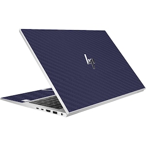 May include: A silver laptop with a dark blue carbon fibre patterned lid. The HP logo is visible on the lid.