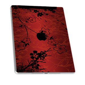 May include: A red and black iPad case with a floral design. The case features a repeating pattern of black flowers on a red background.