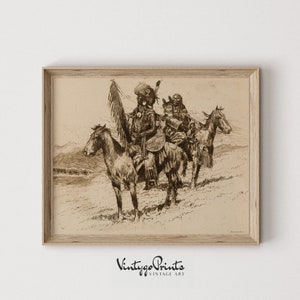 May include: A framed sepia print showing three figures on horseback, likely Native Americans. The central figure wears a feathered headdress and ceremonial clothing. The print is labeled "Vintygo Prints Vintage Art."