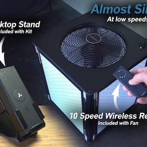May include: A black fan with a 10-speed wireless remote control. The fan is almost silent at low speeds and includes a desktop stand. The text "Almost Silent" and "At low speeds" is displayed above the fan. The text "10 Speed Wireless Remote" and "Included with Fan" is displayed below the fan.