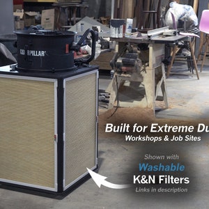 May include: A black and yellow dust collector with a large fan on top. The dust collector is labeled "Caterpillar" and has a large filter on the front. The text "Built for Extreme Dust Workshops & Job Sites" is below the dust collector. The text "Shown with Washable K&N Filters Links in description" is below the text "Built for Extreme Dust Workshops & Job Sites".