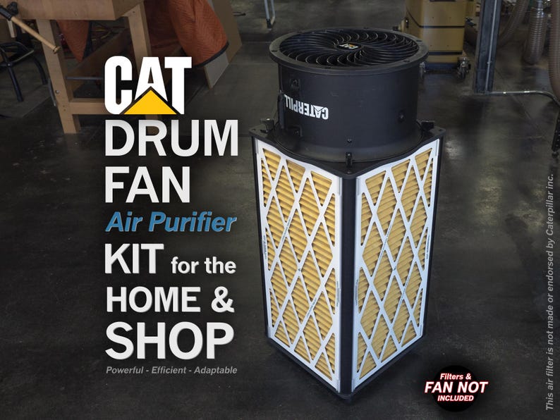 May include: A black drum fan air purifier kit for the home and shop. The kit includes a black drum fan with a yellow and white filter. The text "CAT DRUM FAN Air Purifier KIT for the HOME & SHOP Powerful - Efficient - Adaptable" is printed on the image. The text "Filters & FAN NOT INCLUDED" is printed on the image. The text "This air filter is not made or endorsed by Caterpillar inc." is printed on the image.