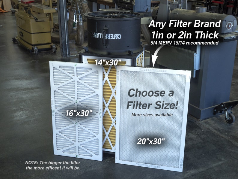 May include: A black dust collector with a filter replacement guide. The guide shows three different filter sizes: 14 inches by 30 inches, 16 inches by 30 inches, and 20 inches by 30 inches. The text on the guide says "Any Filter Brand 1in or 2in Thick 3M MERV 13/14 recommended" and "Choose a Filter Size! More sizes available".