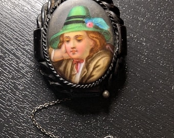 Antique carved Whitby Jet brooch  with hand painted porcelain panel