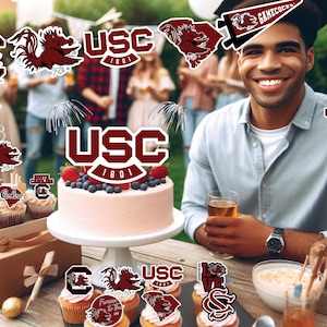 May include: A graduation party celebration with a University of South Carolina theme. Decorations include a cake with the USC logo, cupcakes with the school mascot, and a banner with the words "Gamecocks".