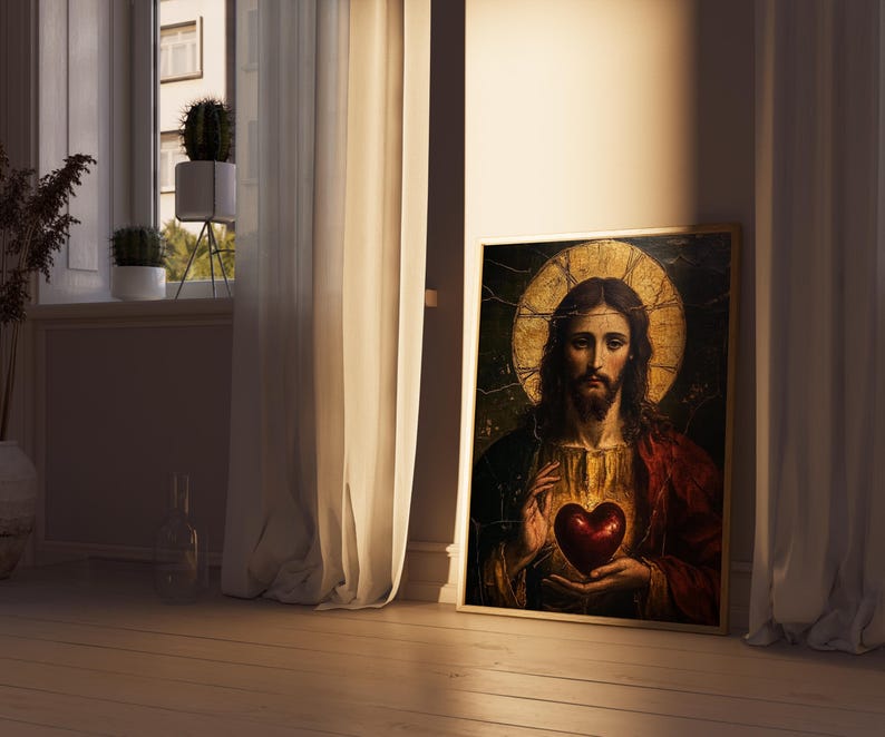 K&ouml;nnte beinhalten: Ein Gem&auml;lde von Jesus Christus mit einem goldenen Heiligenschein, der ein rotes Herz in seinen H&auml;nden h&auml;lt. Das Gem&auml;lde ist in Gold gerahmt und hat einen dunklen Hintergrund.