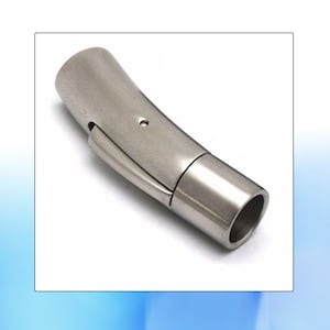 May include: A silver-colored, curved jewelry clasp. The clasp has a cylindrical shape with a hinged section and a small hole. The metal has a brushed finish, giving it a matte appearance. The clasp is designed to connect two parts of a necklace or bracelet.