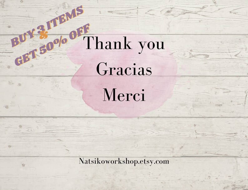 May include: A white ceramic mug with a black handle and the text "But first, coffee" in a black, handwritten-style font. The mug is on a white surface.