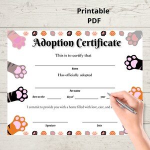 May include: Printable adoption certificate with paw print illustrations. The certificate has fields for the pet's name, the adopter's name, the date of birth, and the date of adoption. It also includes the text "This is to certify that... has officially adopted..."