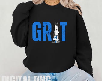 May include: A black sweatshirt with a blue graphic of a football player upside down with the word "GRIT" in blue letters.