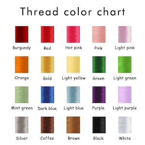 May include: Thread color chart with 15 different colors of thread, including burgundy, red, hot pink, pink, light pink, orange, gold, light yellow, green, light green, mint green, dark blue, light blue, purple, light purple, silver, coffee, brown, black, and white.