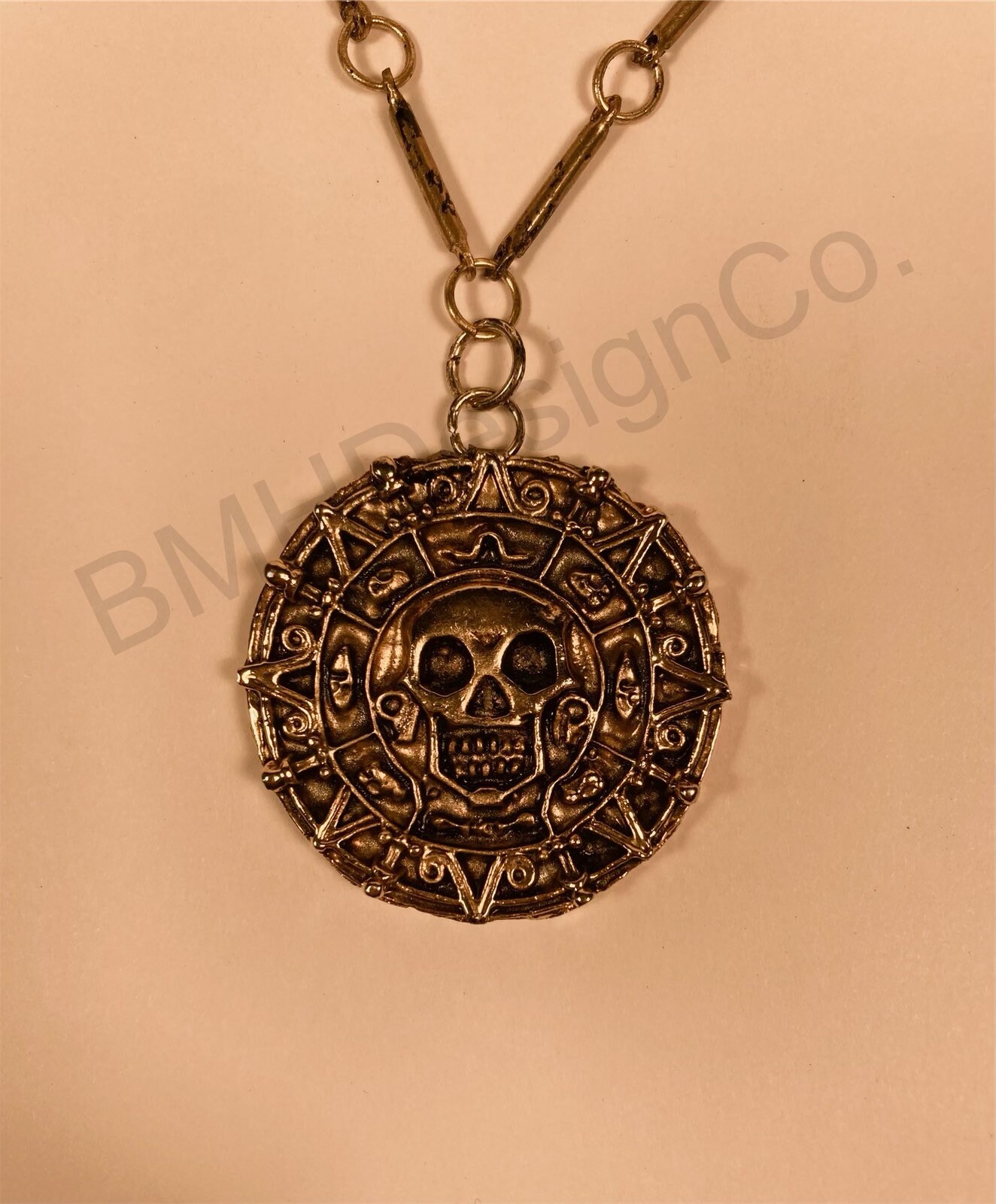 Buy RVM Jewels Pirates of The Caribbean Inspired Pendant Necklace Aztec  Skull Coin Pirate Medallion Jewelry for Kids Men and Women Antic Gold at  Amazon.in