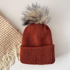 Red Adult Winter Knit Beanie with Pom made with Acrylic and Polyamide Yarn