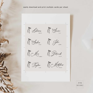 May include: Printable place cards with a simple bow design and names written in cursive. The names include Olivia Walker, Simon Ellis, Sophia Green, John Brown, Mia Summer, Patrick Sullivan, Taylor Clark, and Matthew Walker.