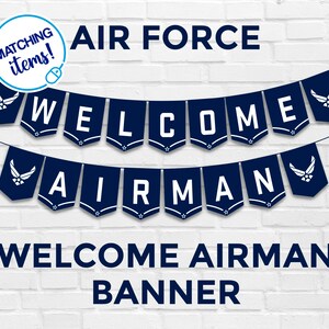 May include: Blue and white welcome banner with the text "WELCOME AIRMAN" and the Air Force logo. The banner is made of felt and has a string for hanging.