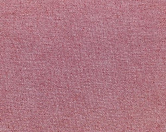 May include: A close-up of a textured, red fabric with a subtle woven pattern.