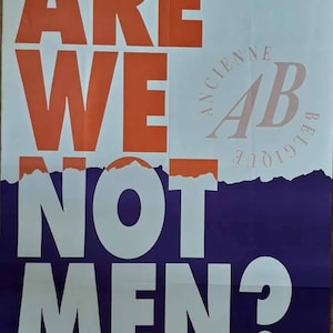 May include: A white poster with the text "ARE WE NOT MEN?" in large, bold, white letters. The top half of the poster is white with the text in orange. The bottom half of the poster is purple with the text in white. The poster has a torn edge at the center.