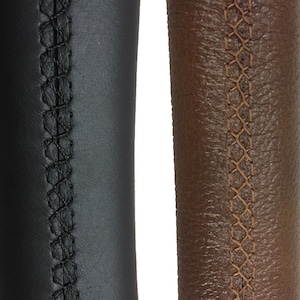 May include: Two close-up images of leather steering wheel covers. The left image shows a black leather cover with black stitching. The right image shows a brown leather cover with brown stitching.