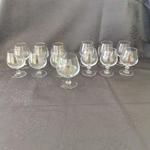 13 Napoleon cognac glasses