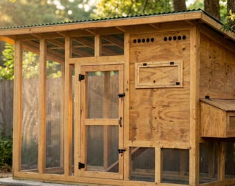 May include: A wooden chicken coop with a gabled roof and wire mesh windows. The coop has a nesting box and a door with a latch. The structure is made of light-colored wood and sits on a concrete base, with a wooden fence in the background.