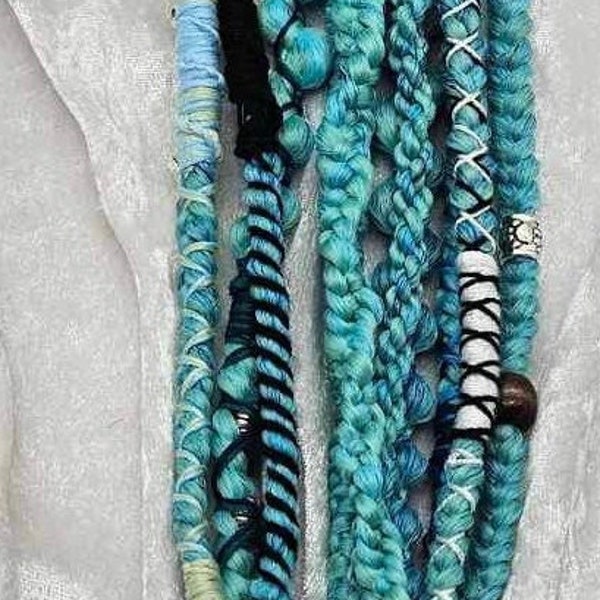 Mixture of braid extensions with teal and light blue mixture