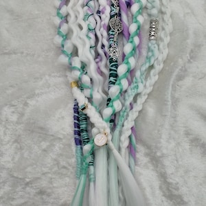 Braids/Dreads in a new array of white, purple and teal!