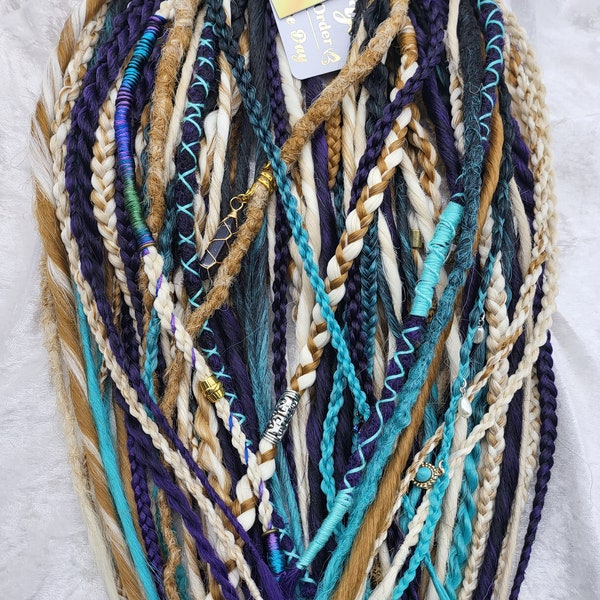 Mixture of Braids, Dreads and Twisted Dreads in a beautiful color arrangement of blondes, purple and teal!