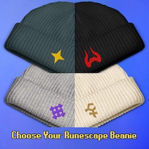 May include: Four beanies in teal, black, grey, and cream colors. Each beanie has an embroidered symbol in yellow, red, purple, and brown. The text "Choose Your Runescape Beanie" is at the bottom.