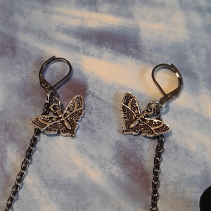 May include: A rustic wooden sign with the text "Welcome to our home" in white lettering. The sign features a distressed finish and a simple, inviting design, perfect for a front porch or entryway.